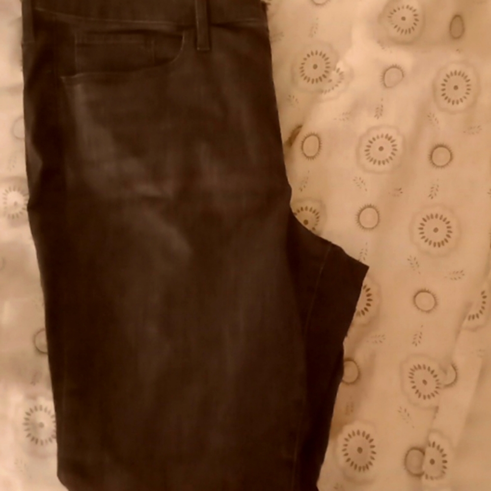 A singular pair of black high rise skinny jeans